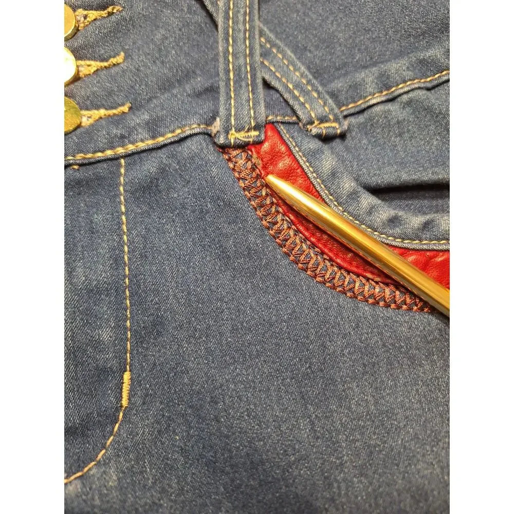 Paparazzi denim Jeans a triple-button high waist and distinctive red Trim